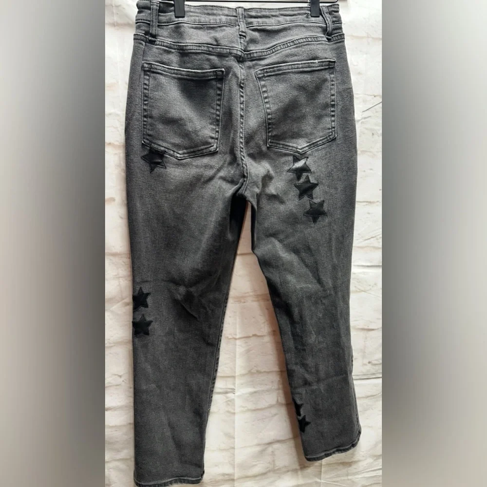 Juicy Couture women’s black‎ jeans with leathers stars size 28